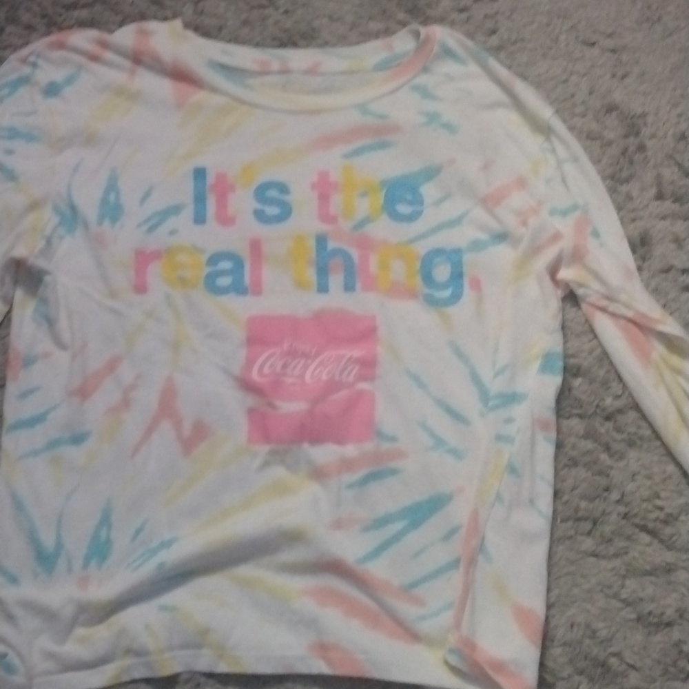 A coca cola shirt with long sleeve